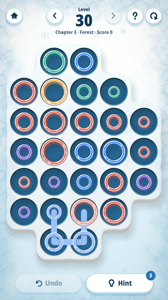 A Ring Chains board: rings of different sizes, one in each well of a shaped tray