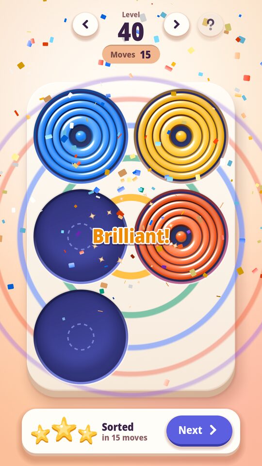 Ring by ring: four trays of rings sorted by colour, a level just won